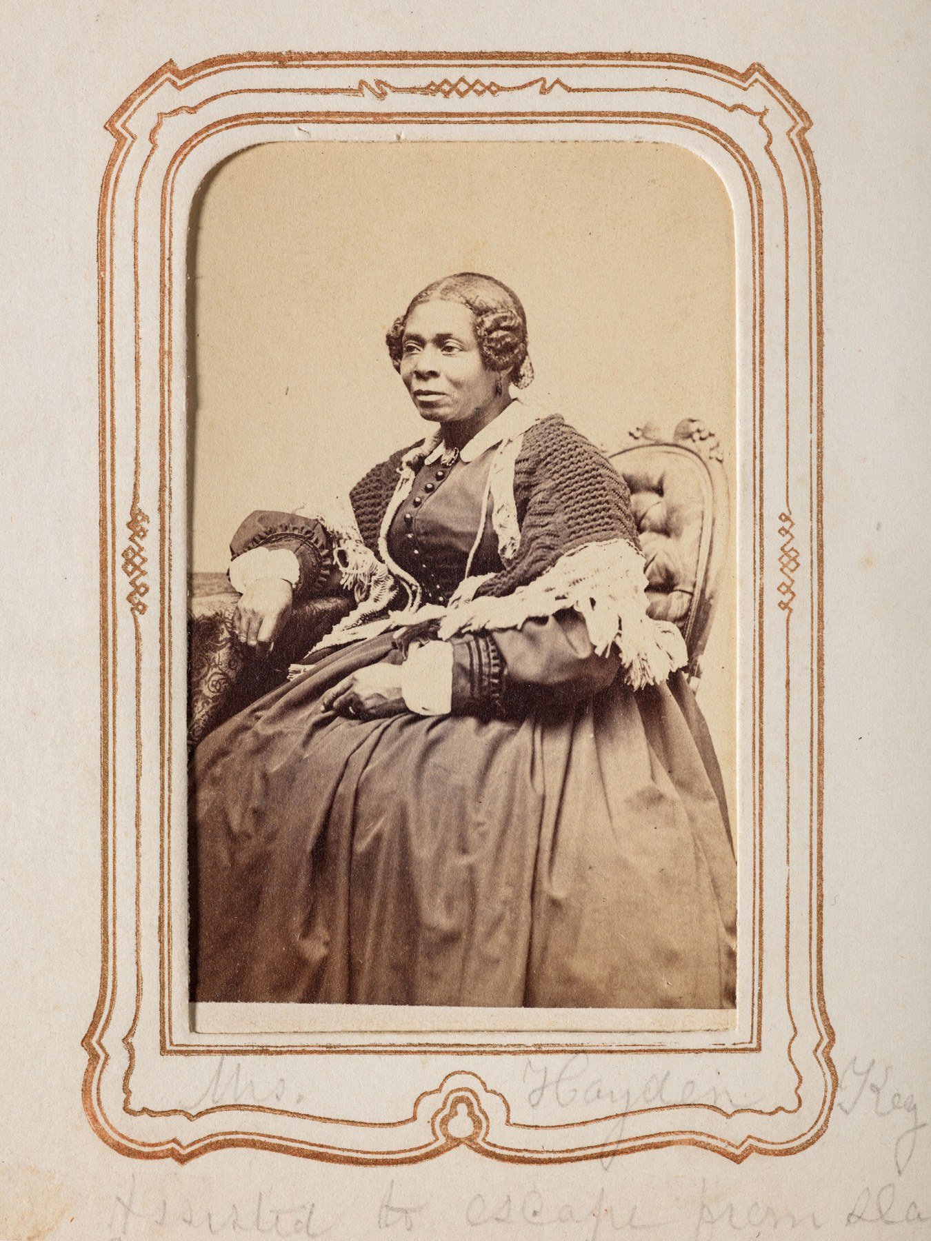 Carte-de-visite portrait of abolitionist Harriet Bell Hayden seated in a dark nineteenth-century dress.