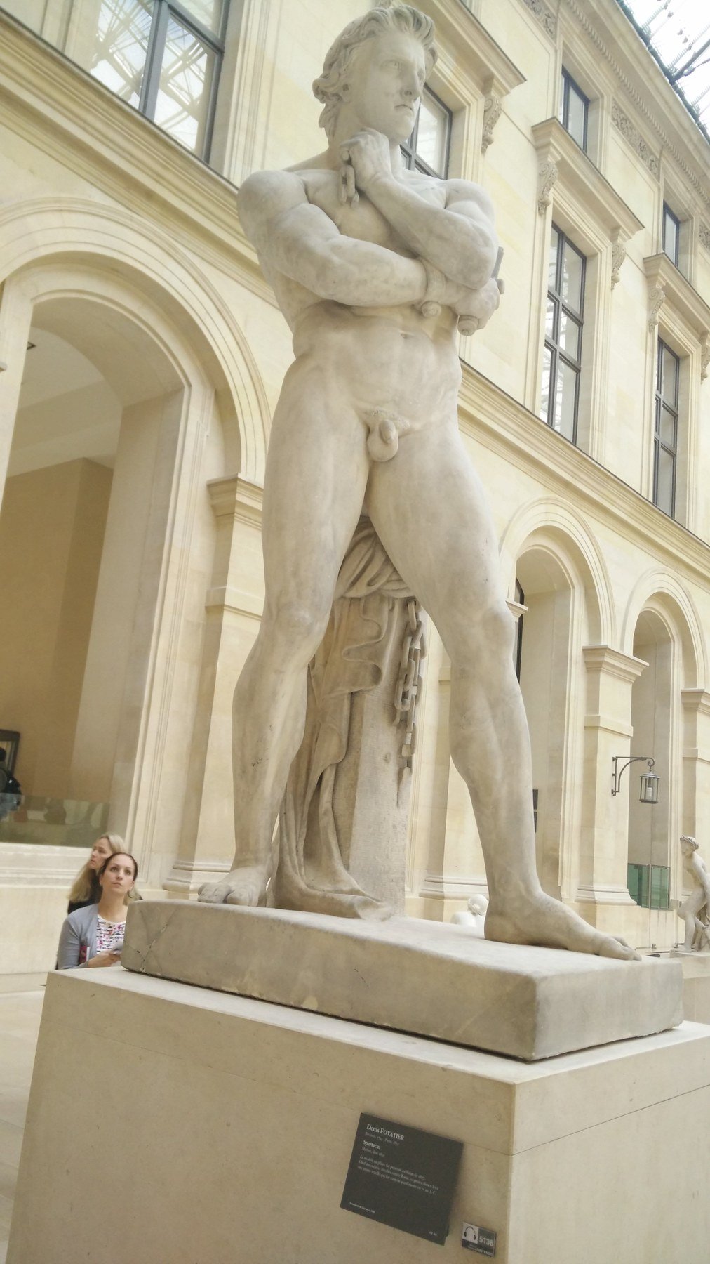 Nineteenth-century marble sculpture of Spartacus by Denis Foyatier, photographed at the Louvre.