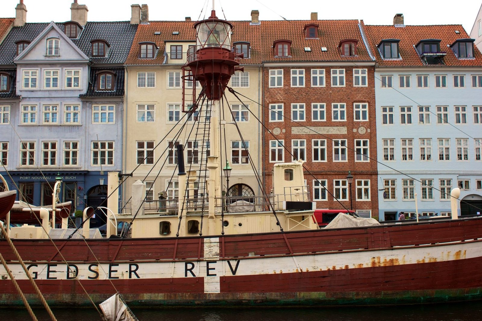 The preserved red-and-white Danish lightship Gedser Rev moored at Nyhavn in Copenhagen in 2012.