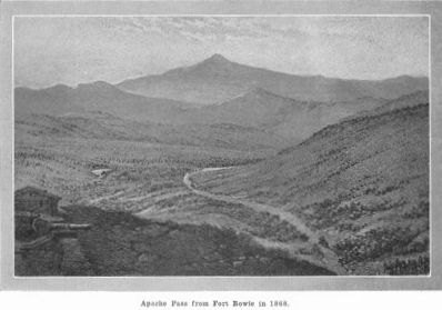 A black-and-white 1868 photograph looking through Apache Pass from the Fort Bowie area.