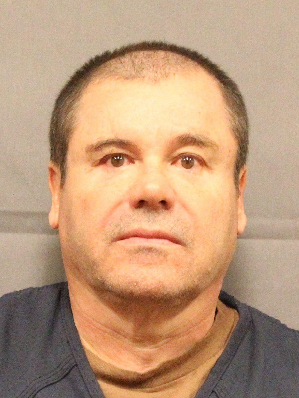 Front-facing DEA booking photograph of Joaquín “El Chapo” Guzmán after his 2017 extradition to the United States.
