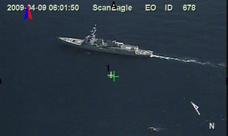 Aerial image of USS Bainbridge operating near the Maersk Alabama lifeboat during the April 2009 hostage crisis.