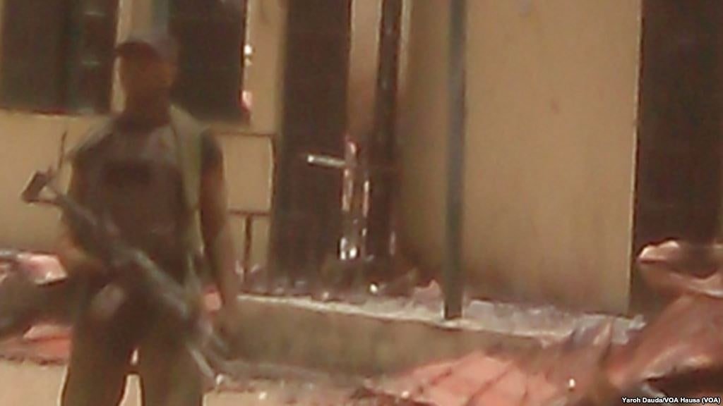 A Nigerian soldier standing guard outside Government Girls Secondary School in Chibok in April 2014.