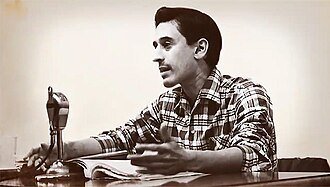 Roque Dalton speaking at a table during the Casa de las Américas poetry-prize event in Havana in 1969.