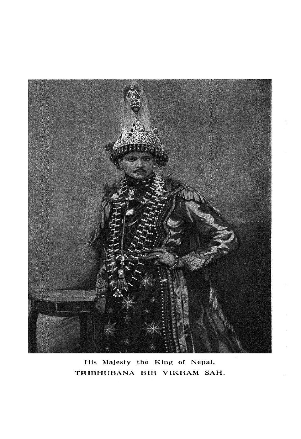 Formal black-and-white portrait of King Tribhuvan of Nepal in ceremonial dress.