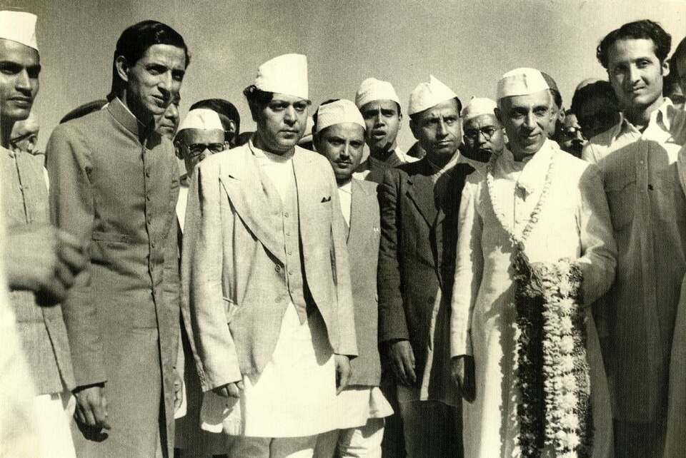 King Tribhuvan standing with B. P. Koirala, Jawaharlal Nehru and others at Delhi Airport in February 1951.