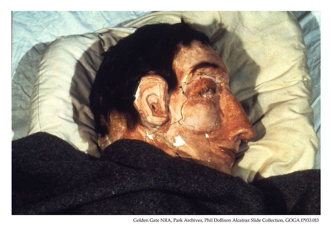 Painted dummy head with human hair like those placed in Alcatraz prison beds during the June 1962 escape.