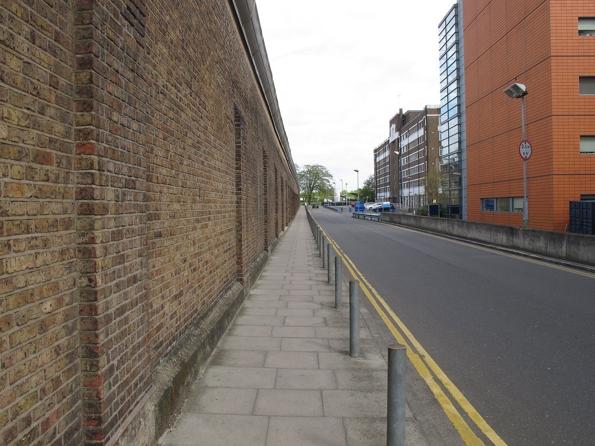 Modern exterior section of the perimeter wall at HM Prison Wormwood Scrubs.