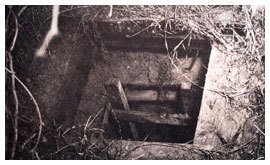 U.S. Army photograph of the discovered entrance to the Camp Papago Park escape tunnel in 1944.