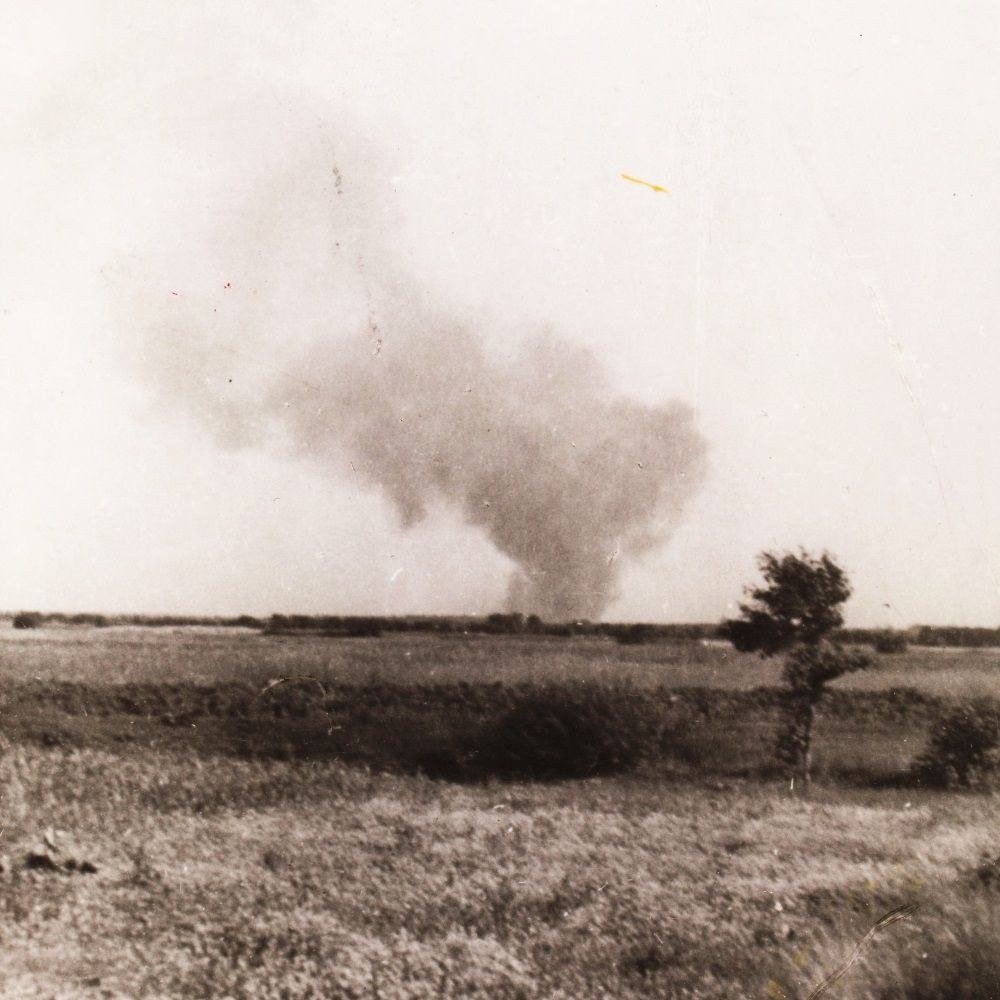Distant smoke rising from the Treblinka extermination camp during the prisoner uprising on August 2, 1943.